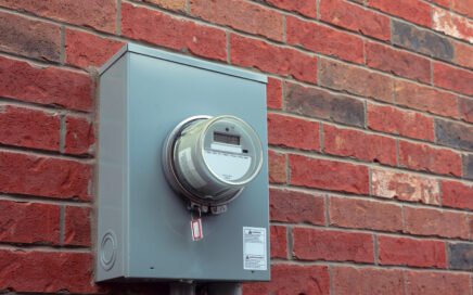 electric meter on side of brick house