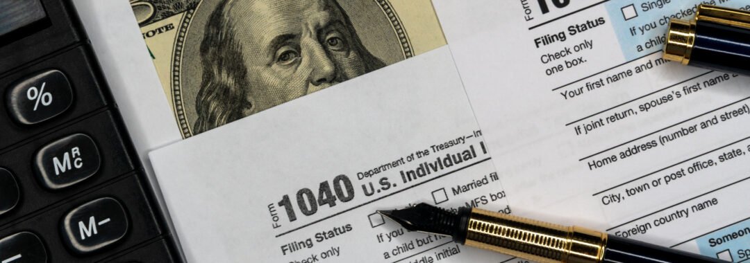 Detail closeup of current tax forms for IRS filing.