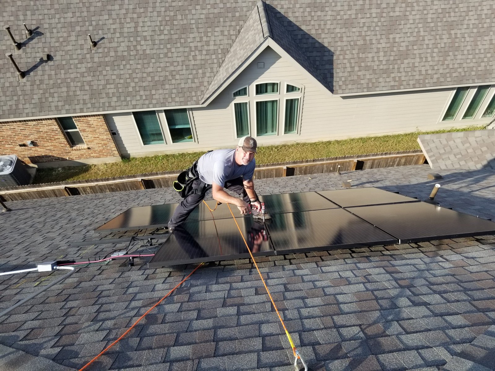 Jeff Butler, founder of TXEN Solar, on a residential solar installation in San Antonio TX